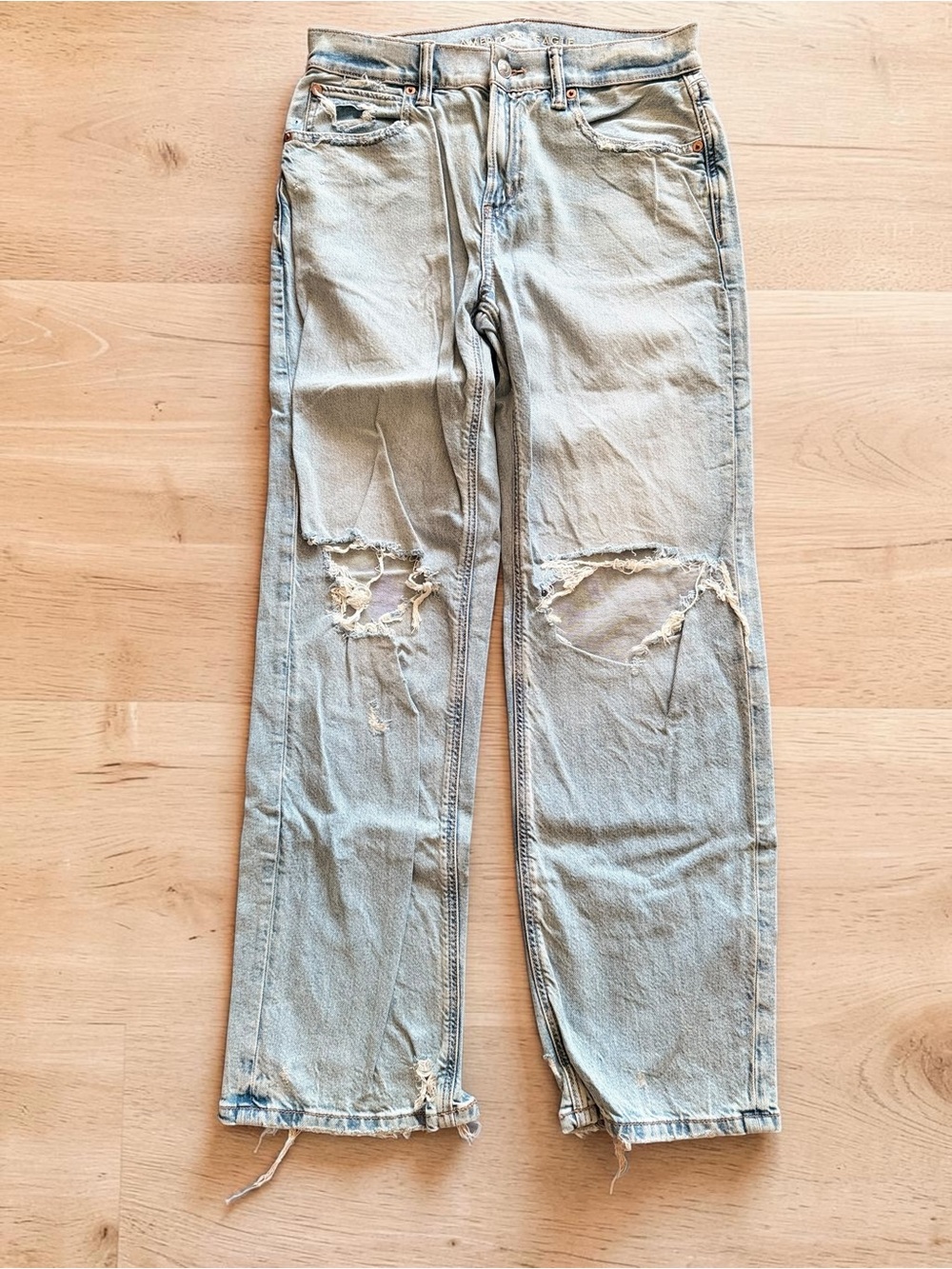 Light Blue Distressed American Eagle Strigid Women's Jeans